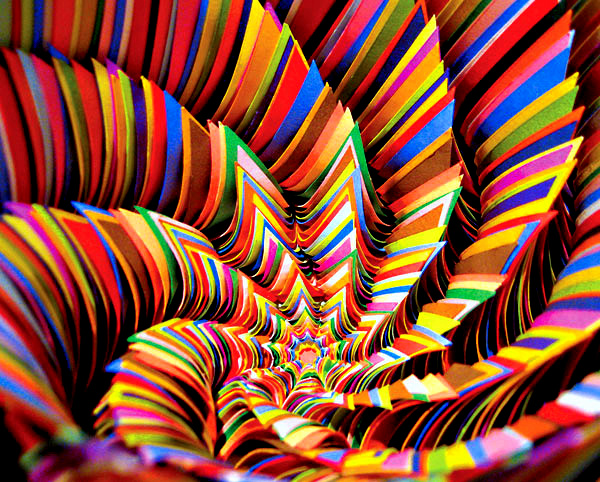 Under the step, toward the right, I saw a small iridescent sphere of almost unbearable brightness. At first I thought it was spinning; then I realized that the movement was an illusion produced by the dizzying spectacles inside it. The Aleph was probably two or three centimeters in diameter, but universal space was contained inside it, with no diminution in size.